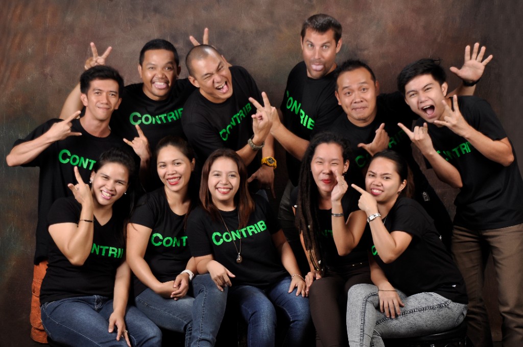 The Zipsite team together, wearing black Contrib shirts